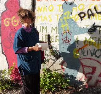 Susan painting on The Wall